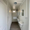 conteneur douche 6 personnes6 Conteneur de douche 6 places neuf 2,40 × 6,00 m avec lavabos